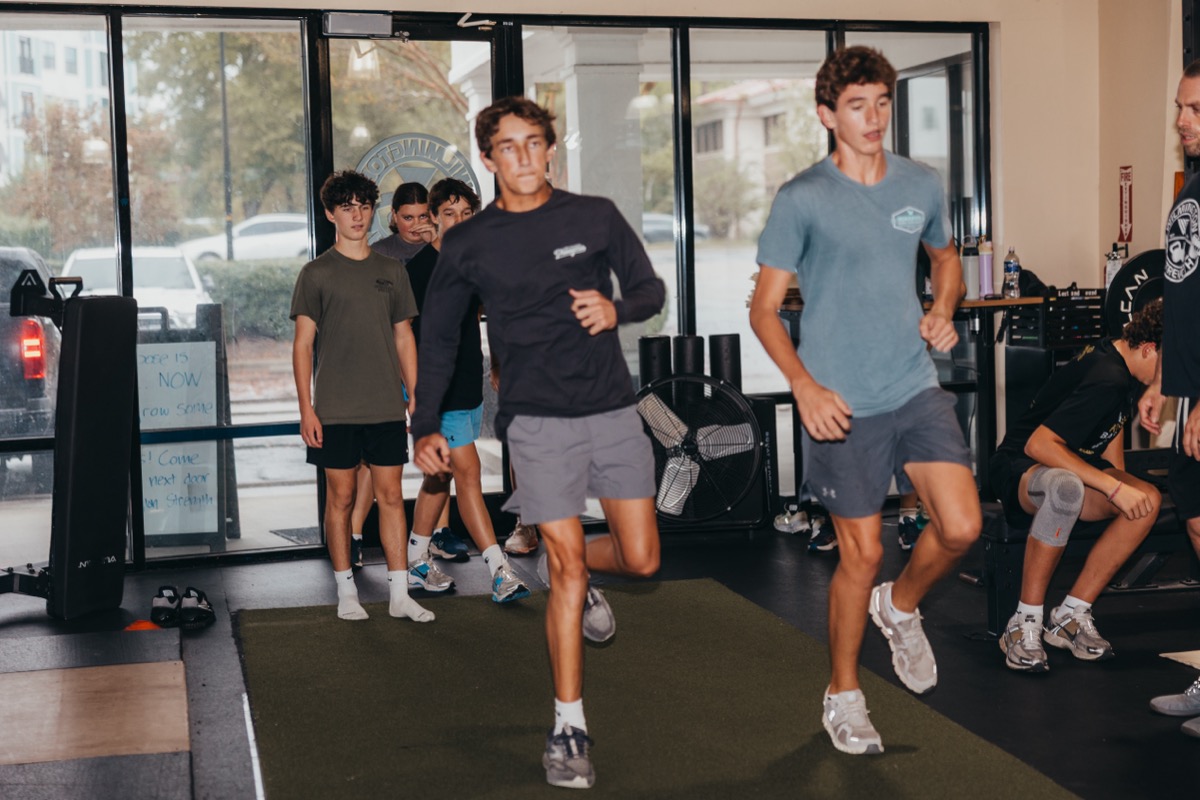 Athlete performing overhead lift